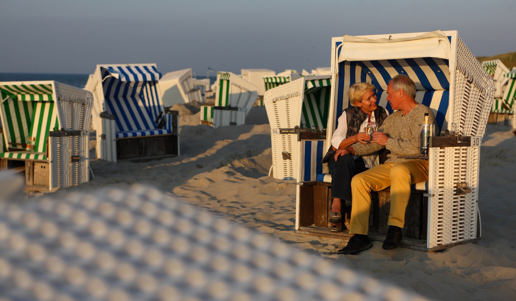 Couple in a beach chair, © Kurverwaltung Wangerooge