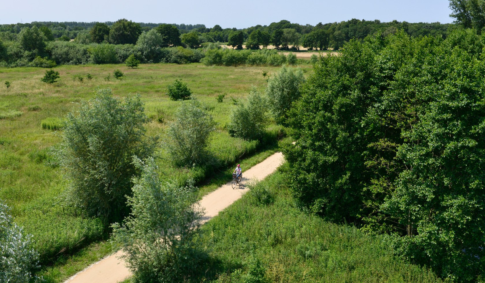 Cyclist rides on cycle path in the Hasetal , © Dieter Schinner 