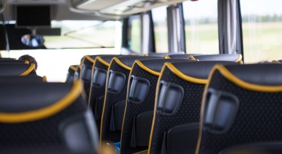 Interior view of a tour bus, © Fotolia / S.Engels