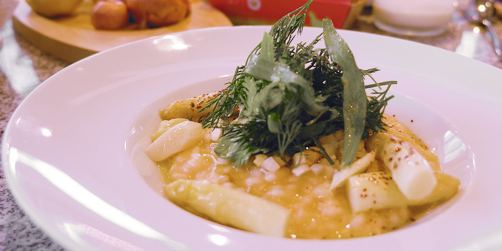 Asparagus risotto with salted almonds and molé in a coffee mushroom vinaigrette
