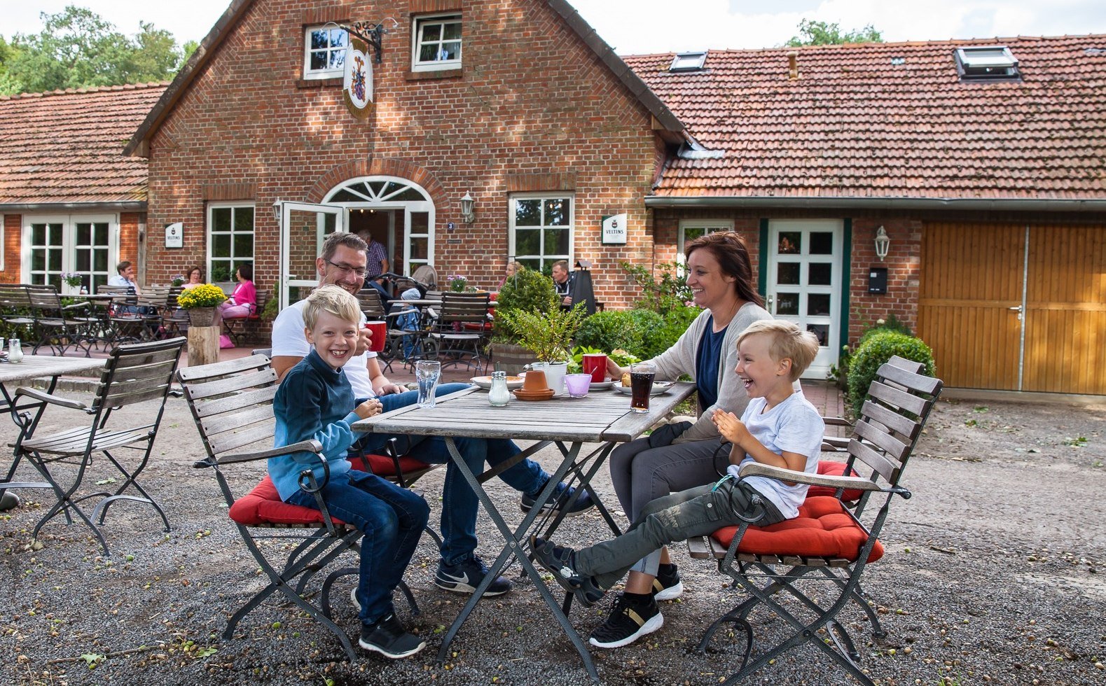 Family having coffee at Café Gut Füchtel in Vechta, © malopo