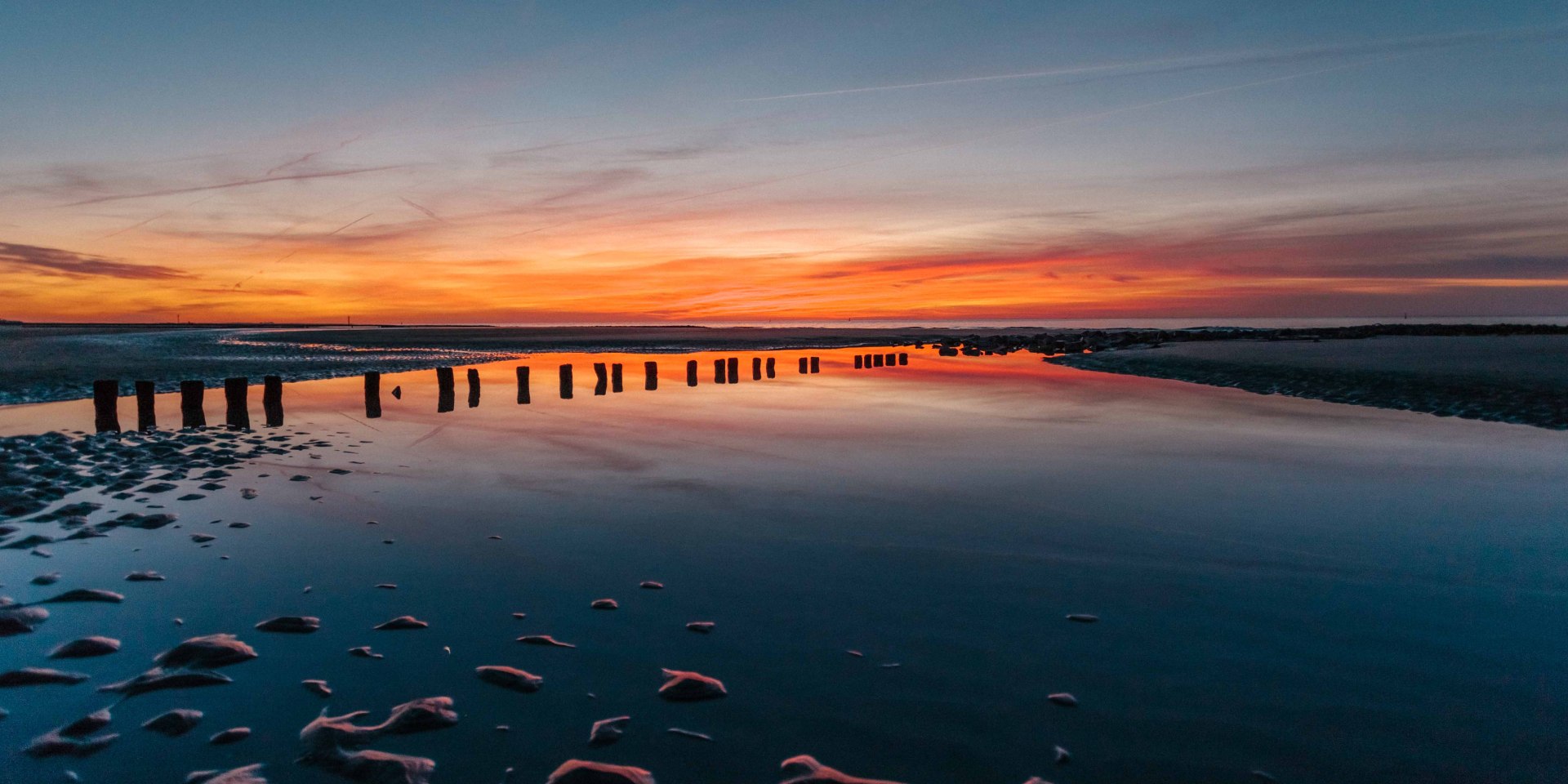 Sunset in the Wadden Sea before Norderney, © Janis Meyer