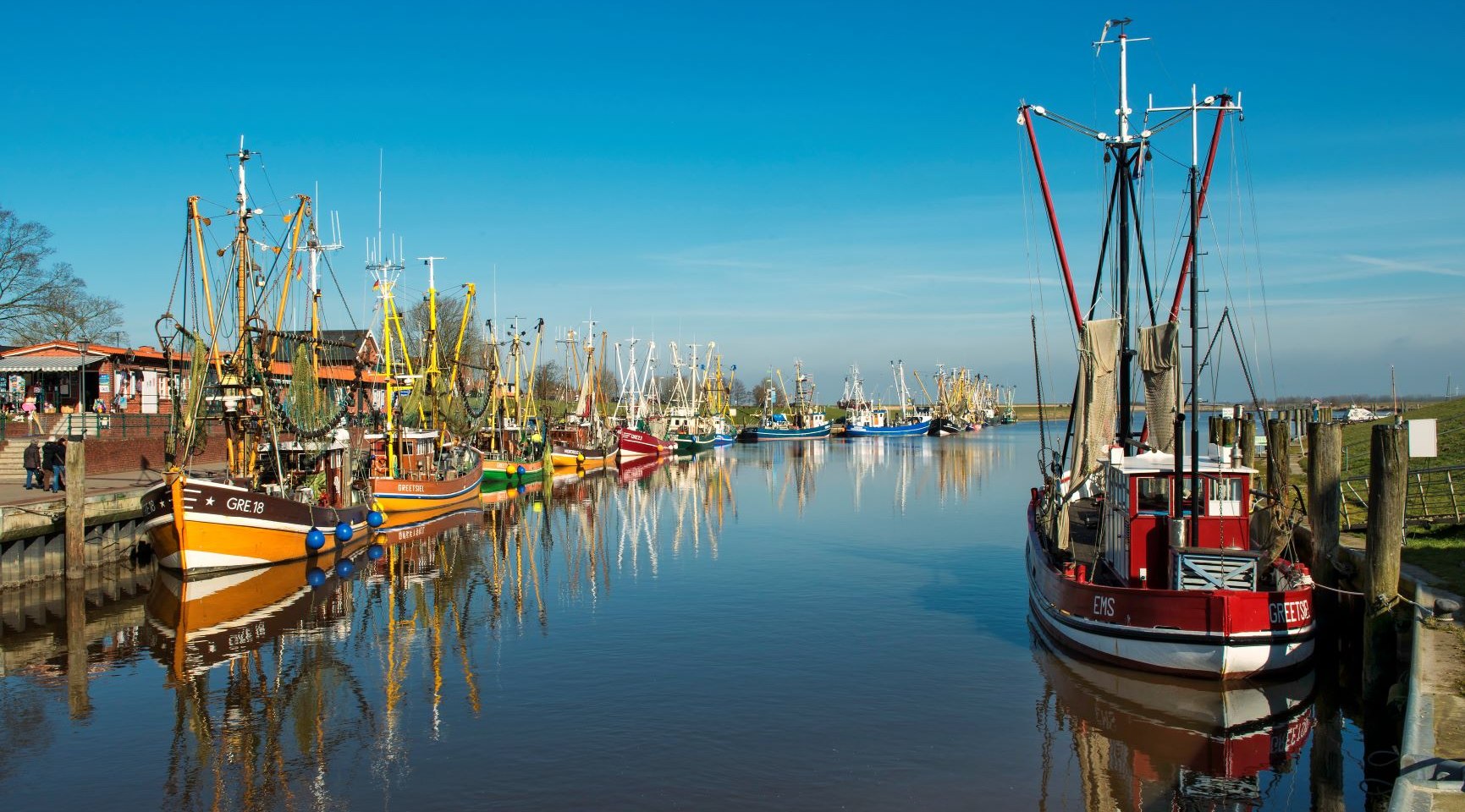 Port Greetsiel, fishing cutter, blue sky, Krummhörn, Ostfriesland, Niedersachsen (Lower Saxony), Germany, © Dieter Schinner