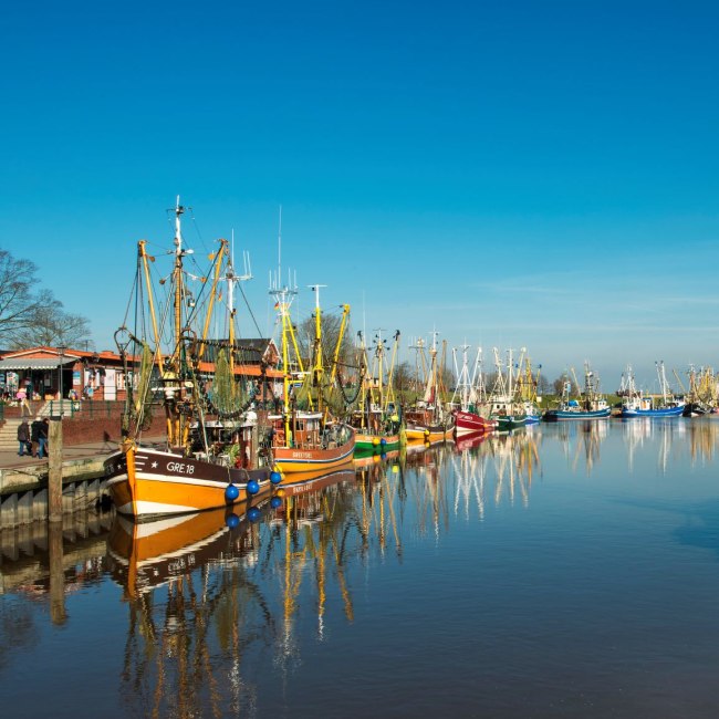 Port Greetsiel, fishing cutter, blue sky, Krummhörn, Ostfriesland, Niedersachsen (Lower Saxony), Germany, © Dieter Schinner